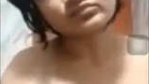 Hot girl has phone call while watching porn video