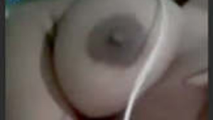 Marital woman with big chest showing on video call