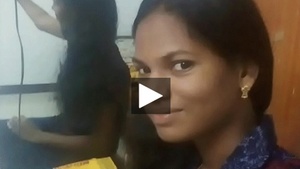 A mature aunt has sex with a virgin teenager in a Tamil film.