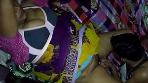 An Indian wife gives her husband a breast crush, cunnilingus, and a deep blow job.