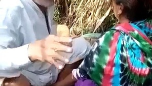 Old man and young woman have sex in the woods