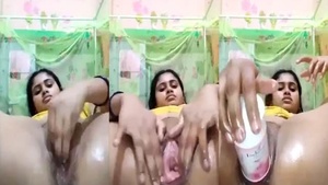 Sultry hot and sultry Desi Bhabhi in pleasurable dildo action on camera