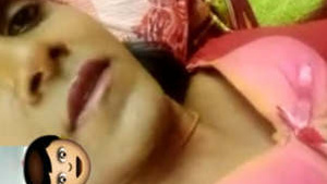 A slim Indian girl performing on a video call