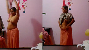 Aunty in change dressed mature beauty