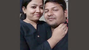 Hot kissing scene in the office with a hot couple.