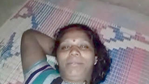 A middle aged Malayalam woman seduces at midnight.