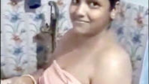 Beautiful Indian woman takes a sexy bath with her stepbrother.