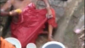 Grandma taking a refreshing outdoor bath