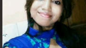 A cute Indian woman is on a video call.