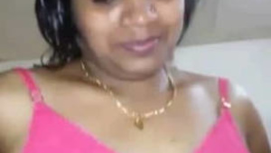 Big-boobed South Indian auntie shows off her pussy in public