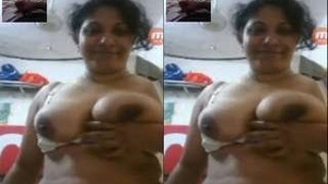 Big booby Sri Lankan wife showing her charms in a homemade video.