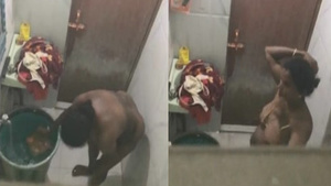Photograph of Indian maid in the bathtub and in the nude.