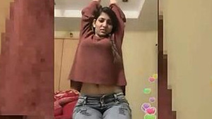 Young Indian woman Nikita Soni shows her belly button
