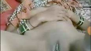 A married woman from a rural area of South Asia exposes her genitals after intimacy.