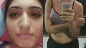 Hot Indian college girl strips and masturbates.