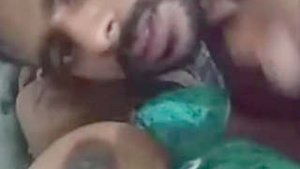 Boob sucking and pussy licking in a video call with a Tamil couple
