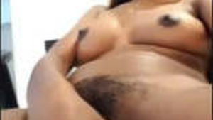A sexually aroused Sri Lankan girl rubbing herself