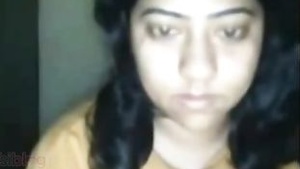 Chubby south Indian girl shows off her large breasts