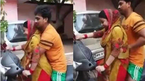 Auntie on a bike, enjoying some groping