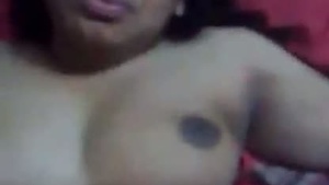 A mature Bhabha with big bosom enjoys sex with her horny partner at home.