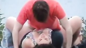 Big-boobed woman enjoys outdoor sex and looks back to get her big ass fucked.