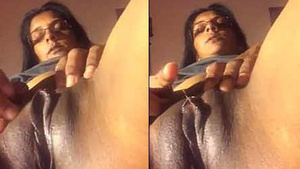 The loud moans of a happy NRI aunt as she has her clitoris teased.