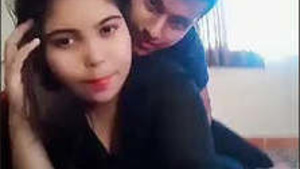 Beautiful Indian girlfriend gives hot kiss to her boyfriend.