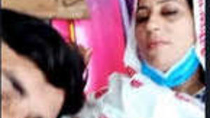 Married Pakistani woman with large breasts gives blow job to her husband