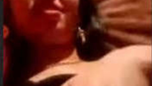 A beautiful Indian woman exposes her breasts and vagina during a video call.