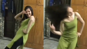 Pretty Indian girl shakes her breasts.