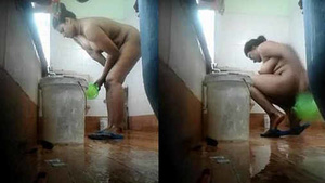 A girl from Malapuram takes a hot bath and exposes her big boobs.