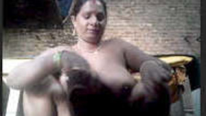 A married woman from a village flaunts her charms