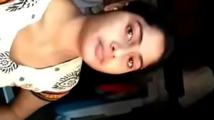 A young woman from a low income farming community taking a selfie of her private part with lotion.