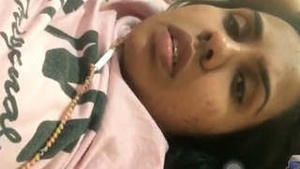Pretty college student exposes her breasts during online video meeting