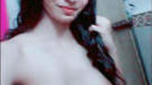 A cute Indian single woman masturbates.
