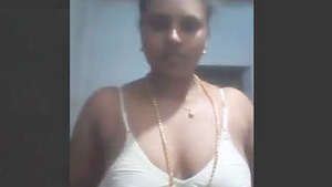 Hot MILF shows off her big chest and wet pussy