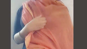 Small-boobed Indian woman reveals her charms in village settings