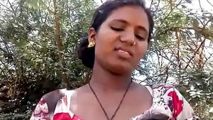 Outdoor sex with a woman from a rural Indian setting.