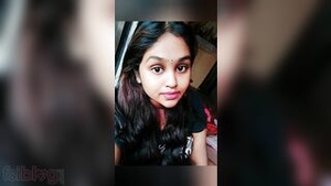 A girl of Indian descent sucks and jerks her big bouncing boobs and rubs her black pussy.