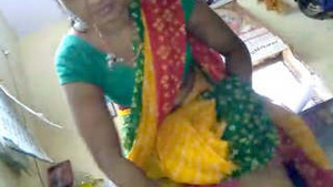 A married woman from a rural area is having intense sex.
