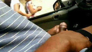 Displaying sensuality in the car in front of the girls