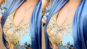 Beautiful Indian homemaker taking sexy self-portrait.