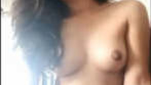 Boobs of Indian babe visible during a video conference