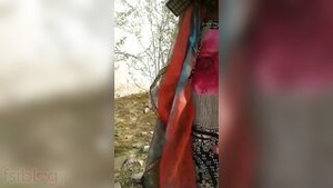 Outdoor homemade media with a help of a red-faced girl from a village