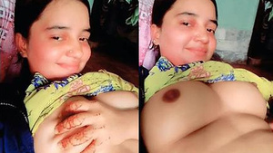 There is a beautiful woman showing her tits and vagina.
