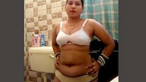Newlywed girl in the bathroom