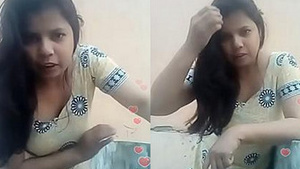 Beautiful Indian house wife showing her charms