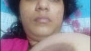 Boobs of the Indian looking woman is revealed.