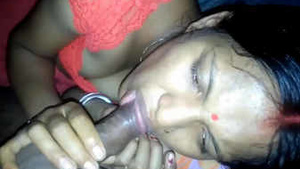 Beautiful wife gives blowjob to her husband’s friend.