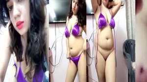 This is a private video of a woman from the East displaying her big melons.